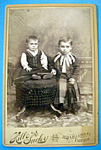 It's Not Funny - Cabinet Photo Of Boys In Skirts