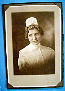 On Call - Cabinet Photo Of A Pretty Nurse