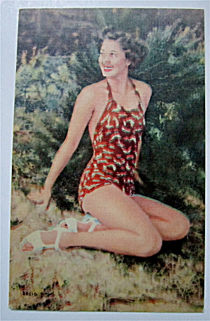 Woman Sitting On Sand Smiling Postcard