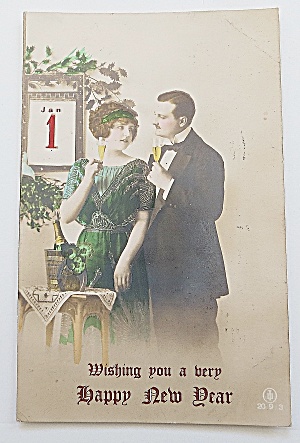 Man & Woman Talking & Drinking On New Years