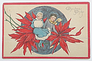 Christmas Cheer With Man & Woman Sitting On Flower