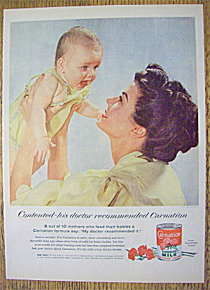 1955 Carnation Milk With Mother Holding Up Baby