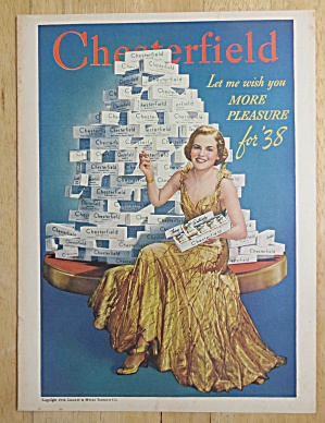 1938 Chesterfield Cigarettes W/woman Sitting By Stack
