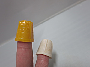 Vintage Thimble Lot Of Two Plastic One White One Yellow