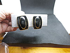 Vintage Monet Black Enamel Gold Tone Clip On Earrings