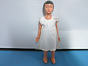 Vintage Indian Doll Hard Plastic 5 1/2 Inch Oil Cloth Dress