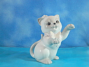 Porcelain Cat Playing With Butterfly