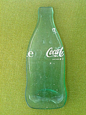 Flattened Melted 12 Oz. Coke Bottle