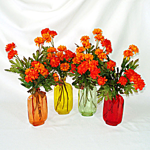 4 Colorful Glass Bottle Vases With Artificial Orange Mums