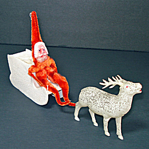 Clay Face Christmas Santa In Cardboard Sleigh, Celluloid Reindeer
