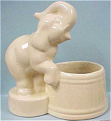 Yellow Pottery Elephant By Barrel Planter