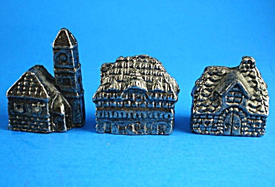 Three Miniature Metal Houses