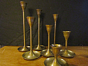 Vintage Brass Graduated Height Seven Candlestick Set