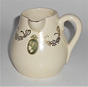 Roseville Art Pottery Early Medallion Side Pour Creamer