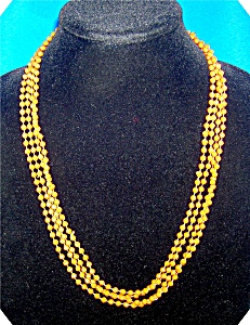 Two Strand Amber Color Plastic Bead Necklace . . . .