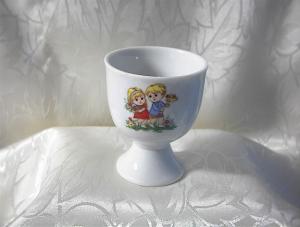Unmarked Boy & Girl Porcelain Egg Cup