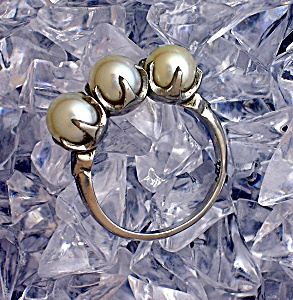 Magnificent 3 Pearl Palladium Claw Set Ring . . . .