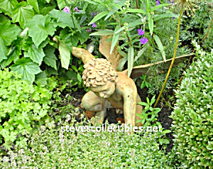 Winged Statuary In The Garden Photograph - Ltd Edition