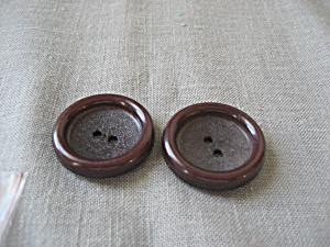 Two Brown Buttons