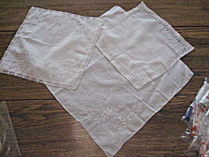 Three White Handkerchiefs