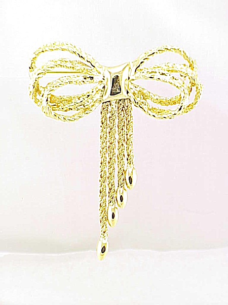 Gold Tone Bow Brooch With Four Dangling Tassels